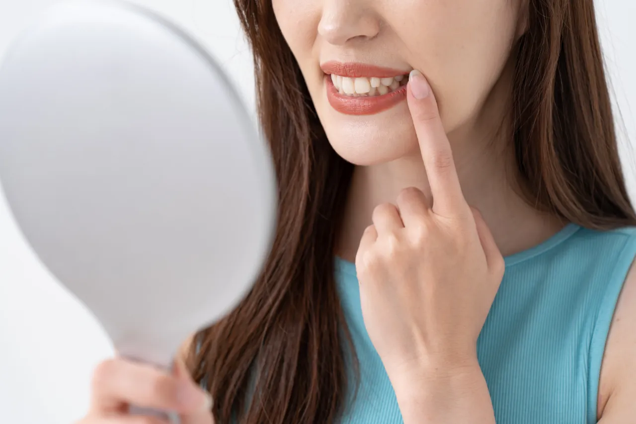 Woman in her early 30s considering orthodontic treatment